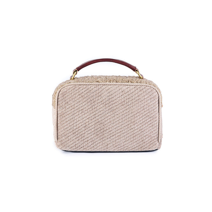 Beige textured handbag with brown handle, rectangular shape