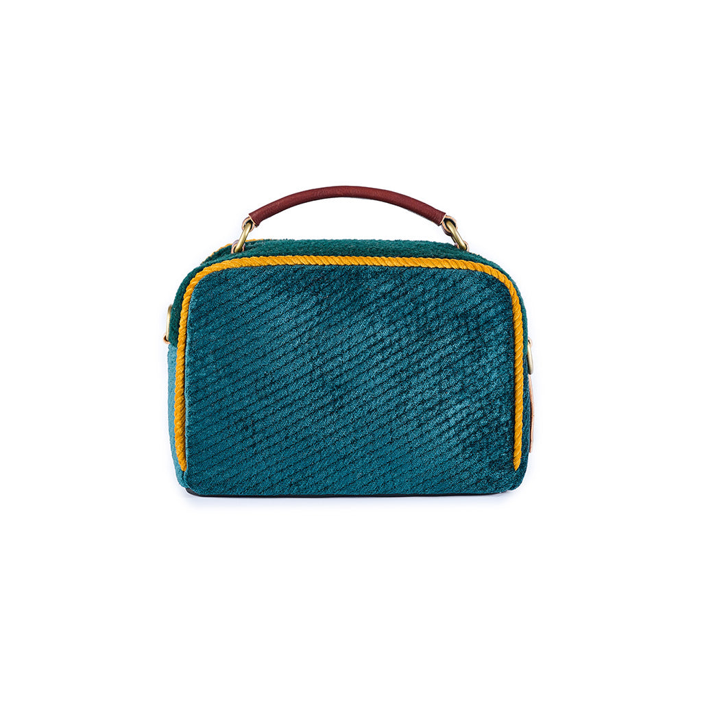 Teal woven handbag with brown leather handle and yellow trim