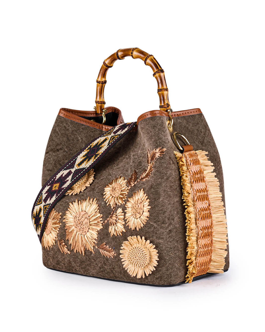 Handcrafted floral embroidered handbag with bamboo handles and an ethnic patterned strap