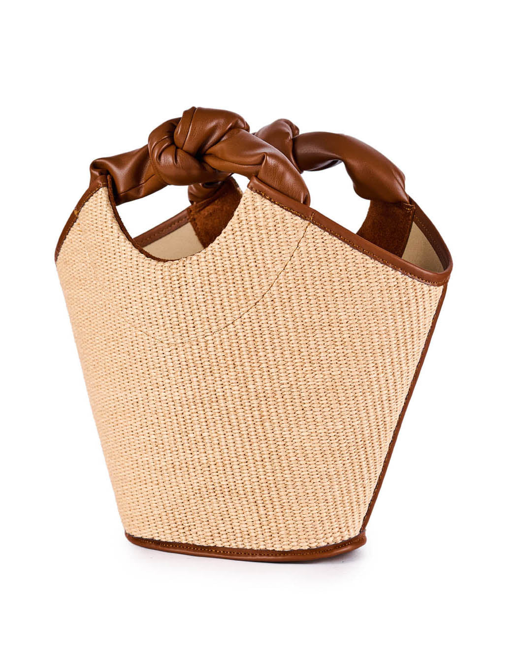 Beige woven tote bag with brown leather handles and trim