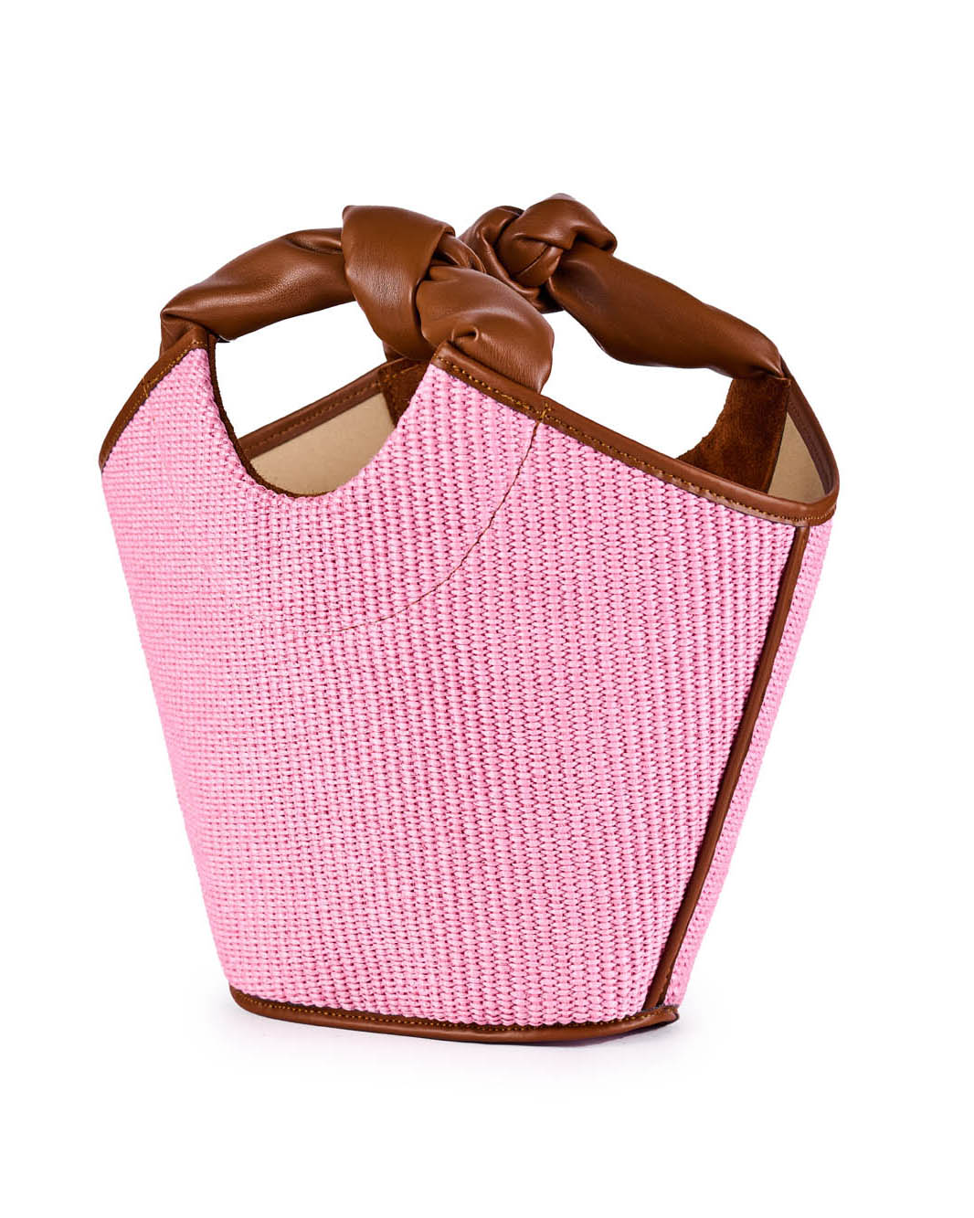 Pink woven handbag with brown leather handles