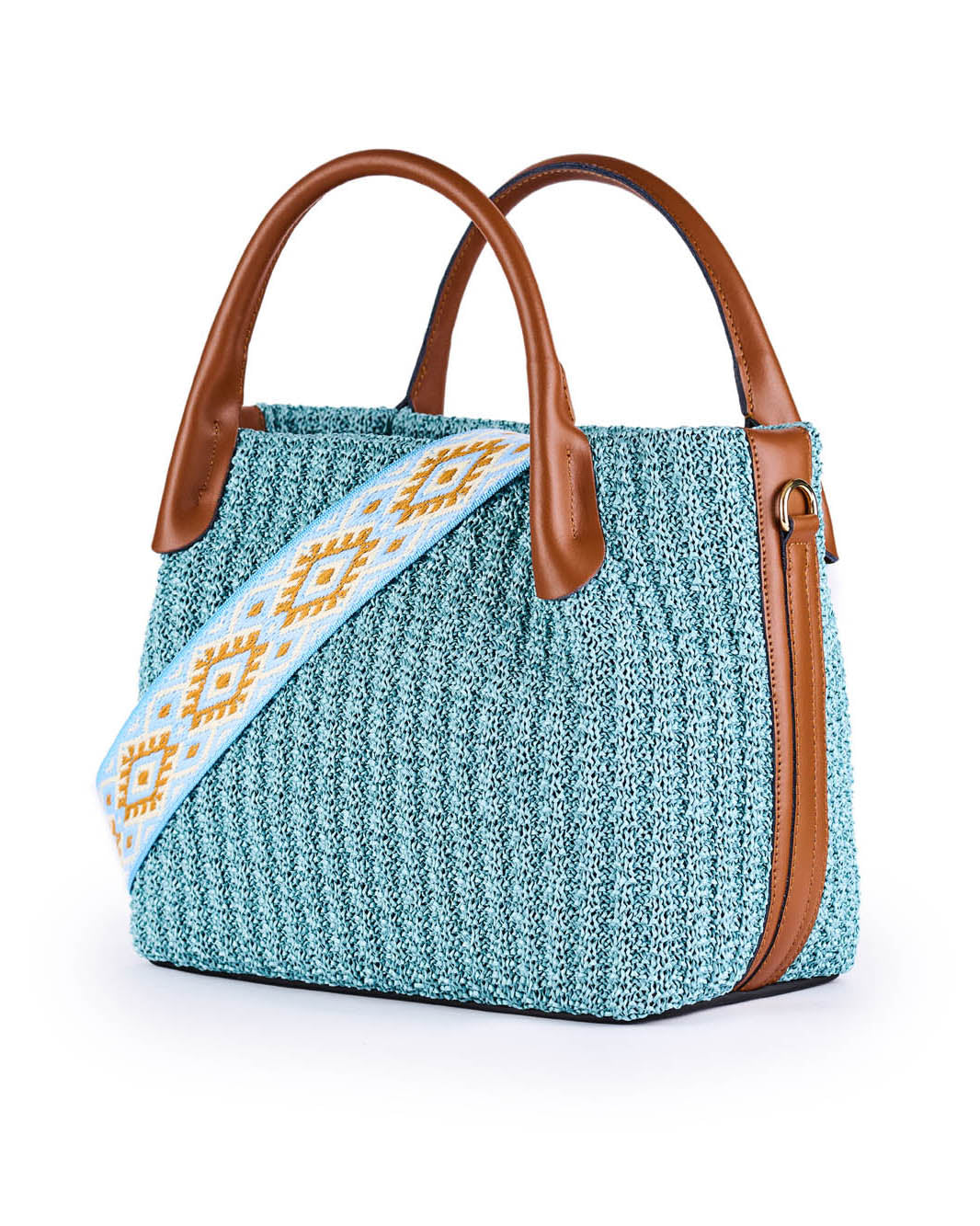 Blue woven handbag with brown leather accents and patterned strap