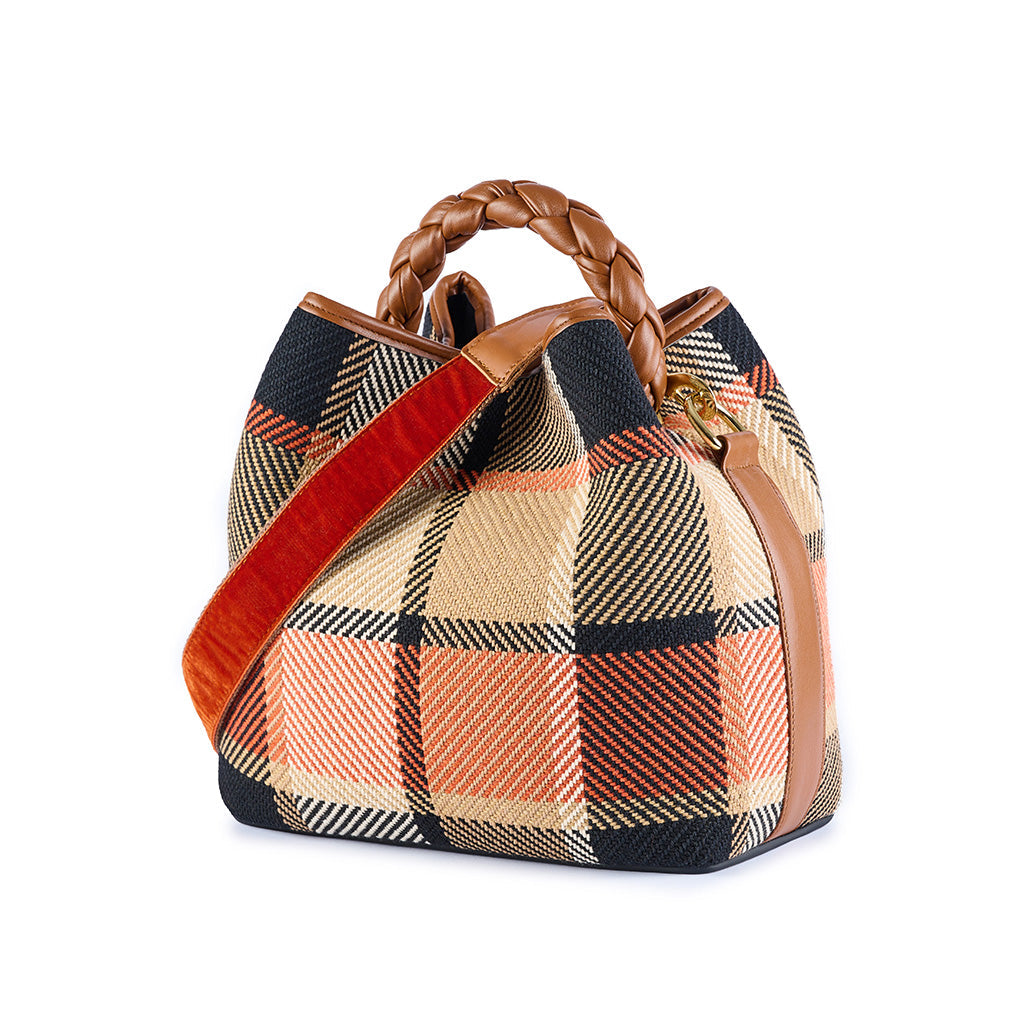 Plaid handbag with leather braided handle and red shoulder strap