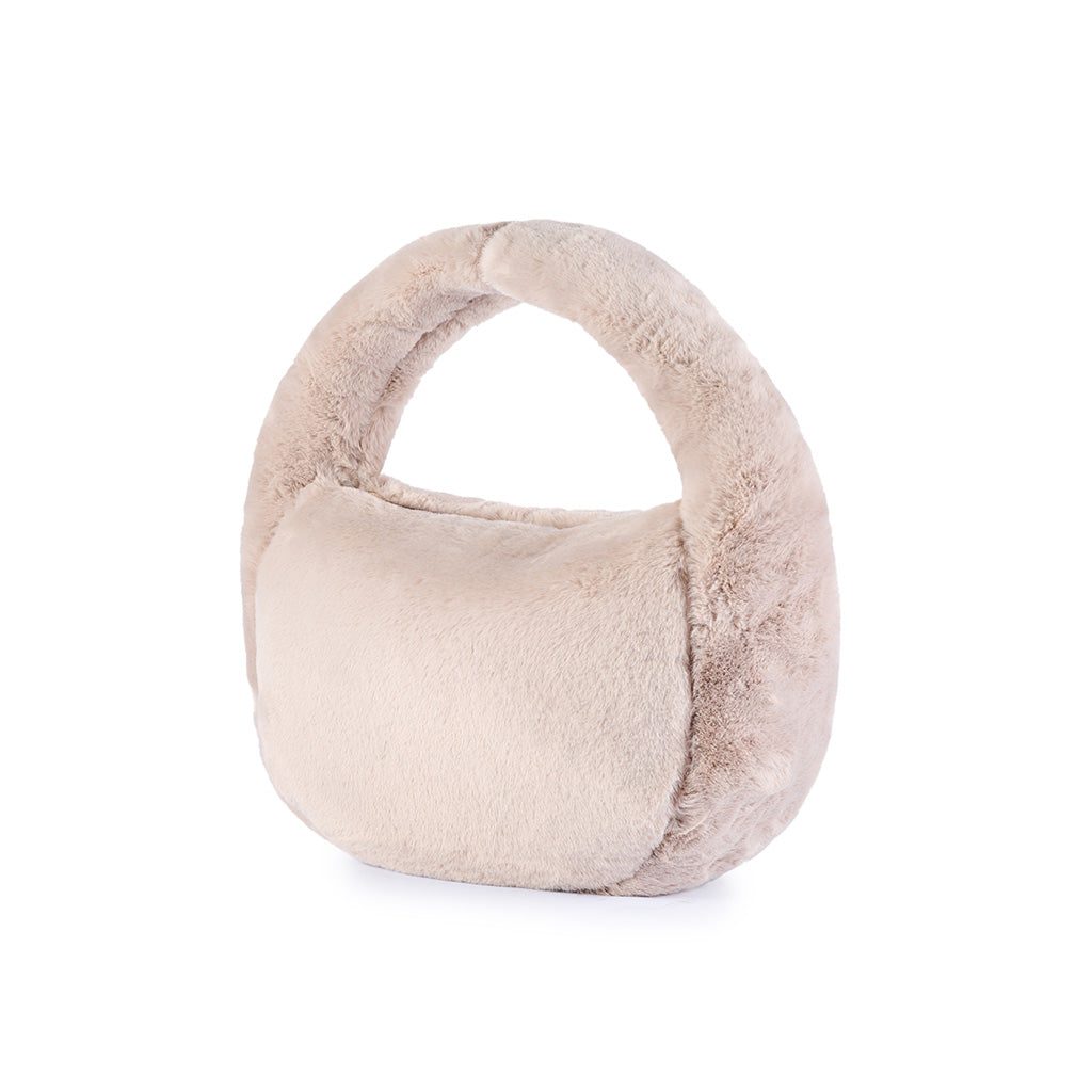 Plush beige handbag with circular handle on white background