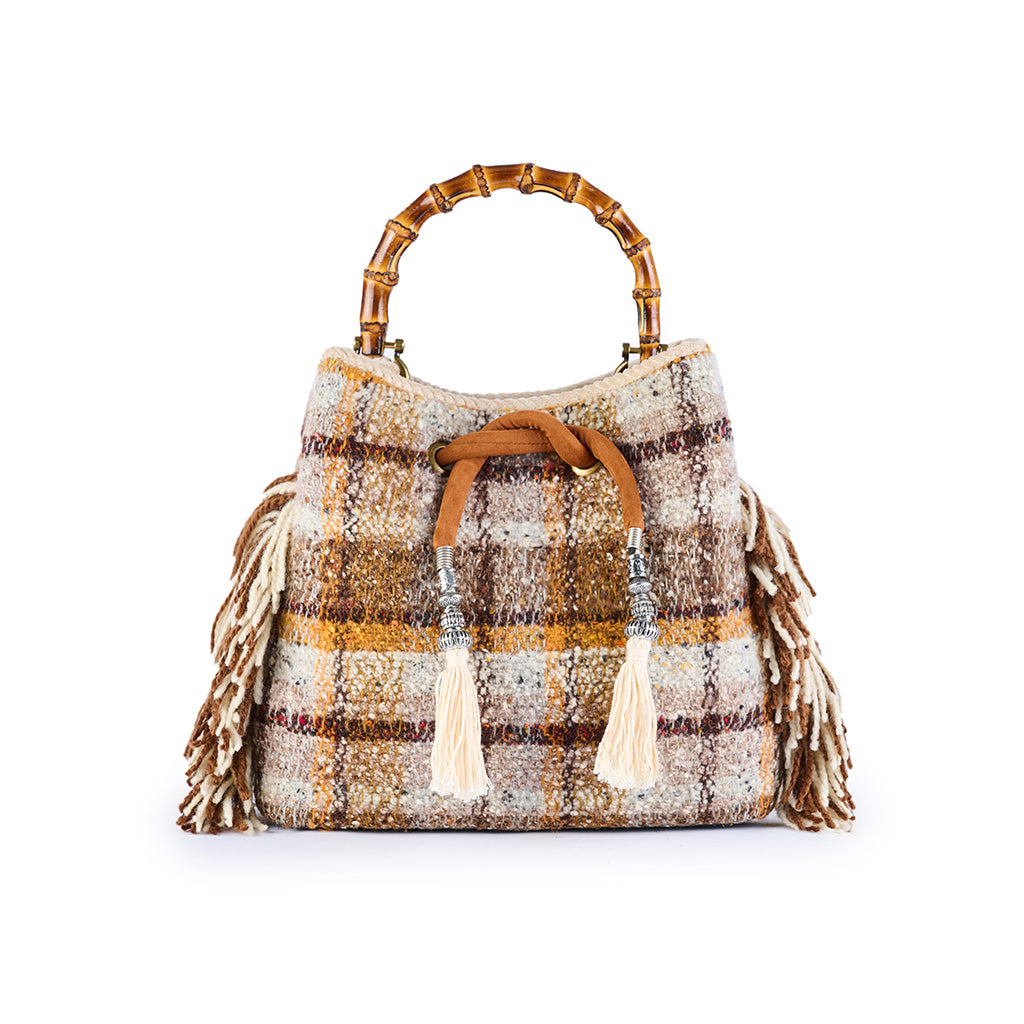 Woven plaid handbag with bamboo handle and tassel accents