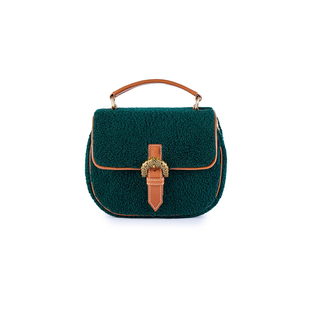 Emerald green sherpa handbag with brown leather accents and gold buckle