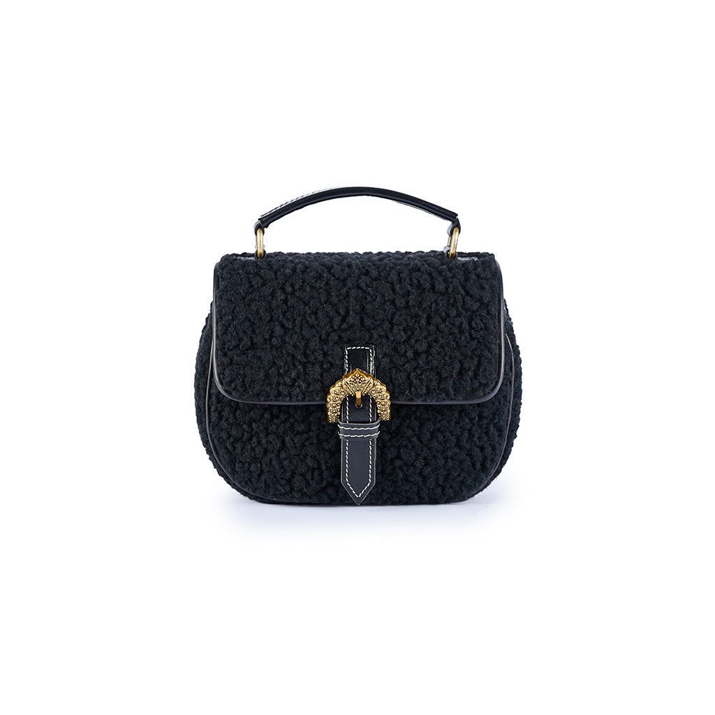 Textured black handbag with gold buckle and handle