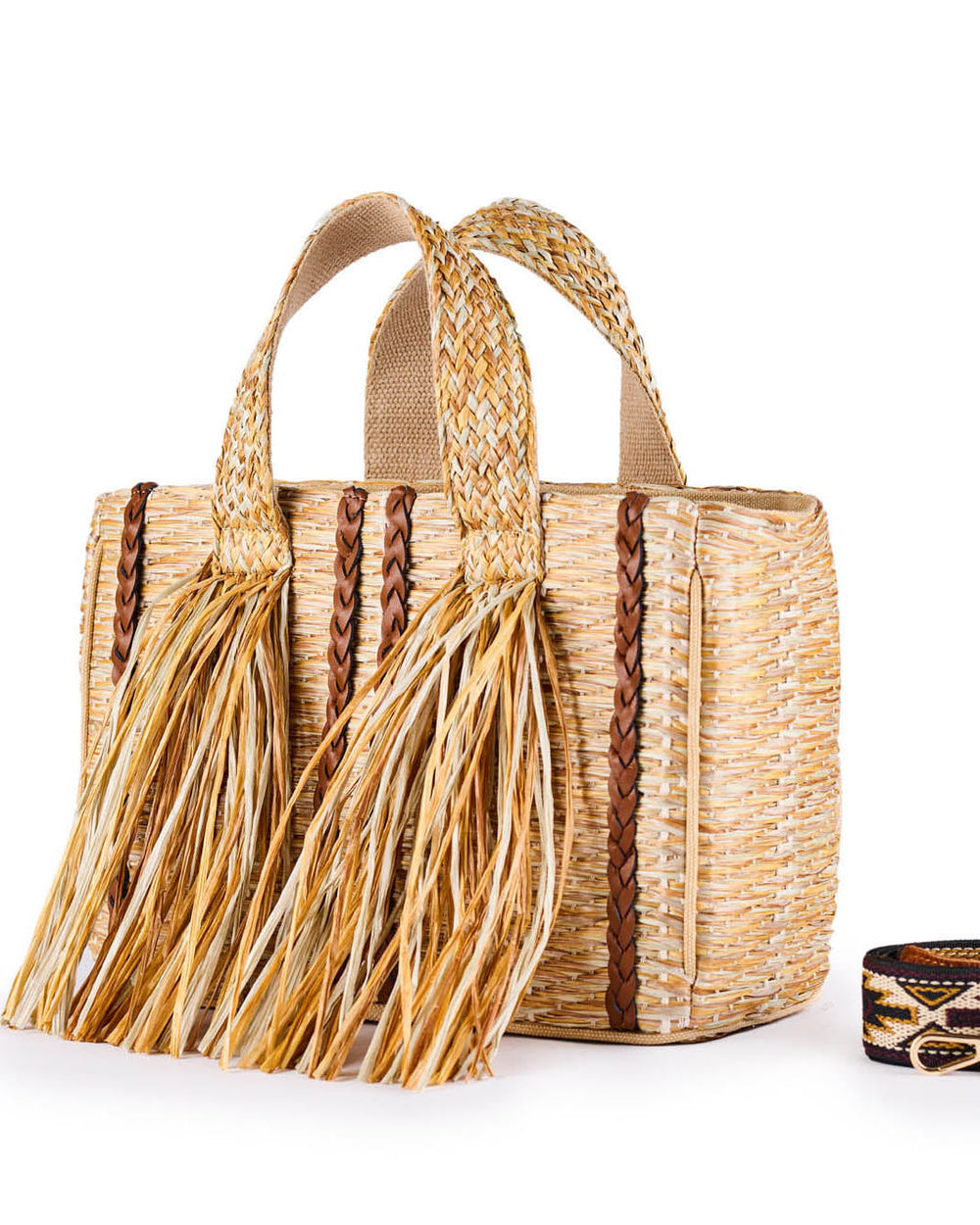 Woven straw handbag with braided leather accents and fringe detailing