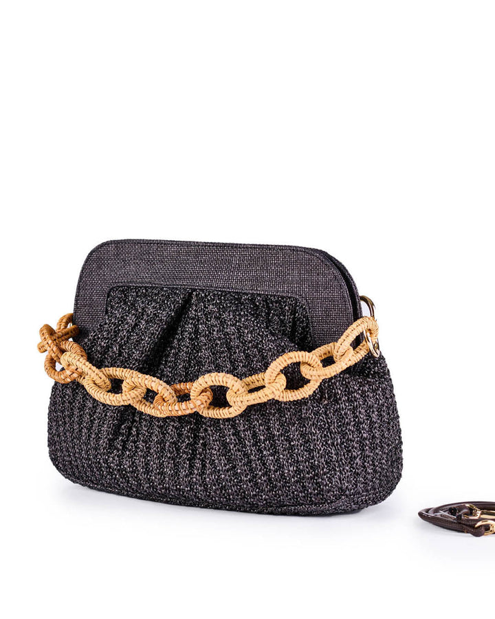 Elegant black textured handbag with golden chain detail on white background