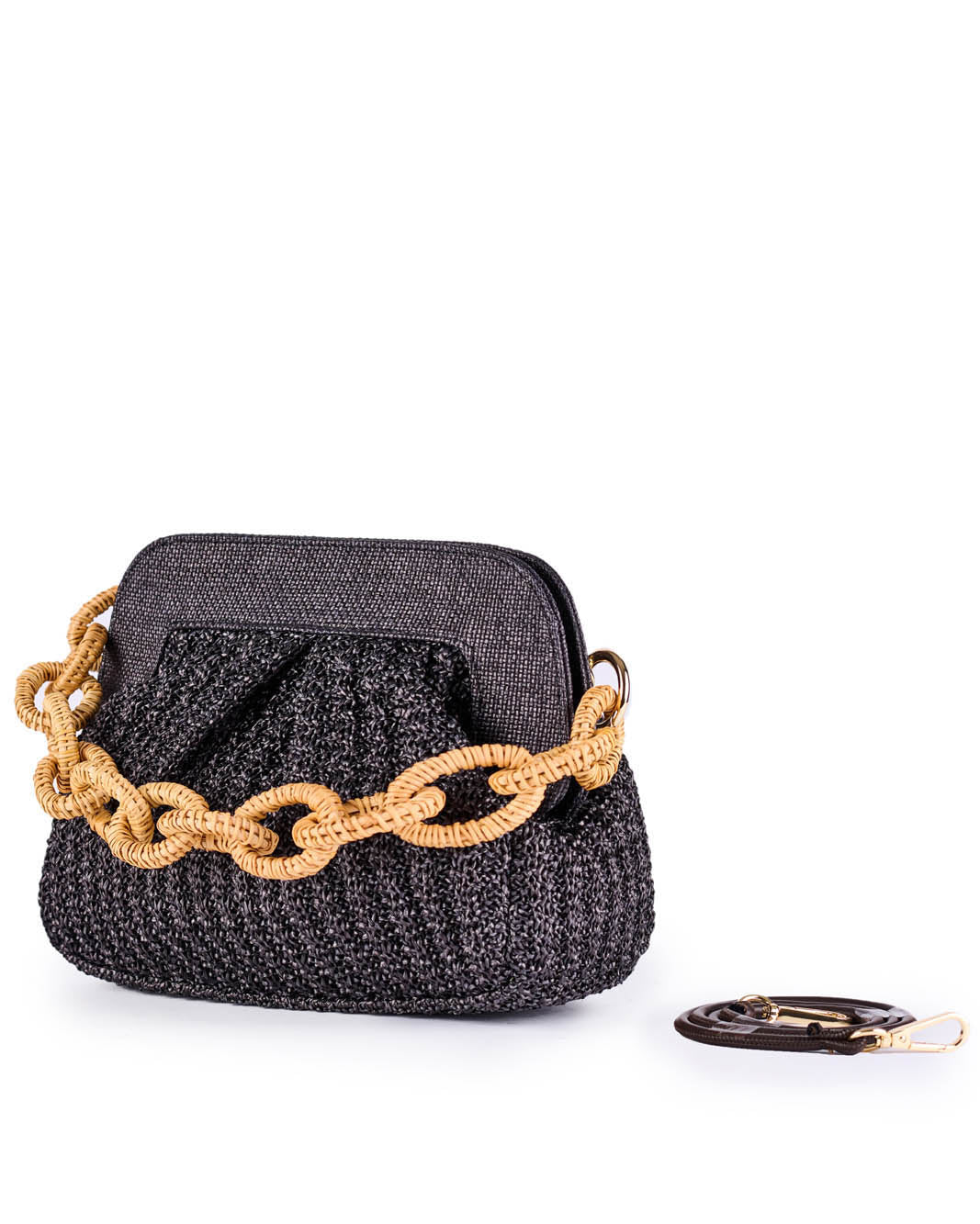 Black textured handbag with large woven tan chain strap and detachable black strap