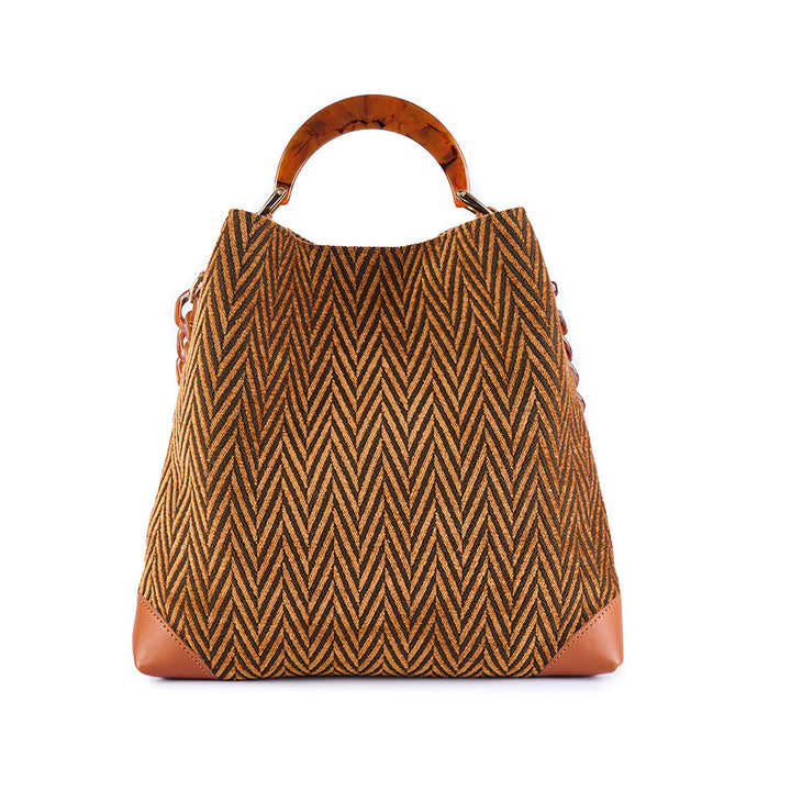 Brown and tan chevron patterned tote bag with leather accents