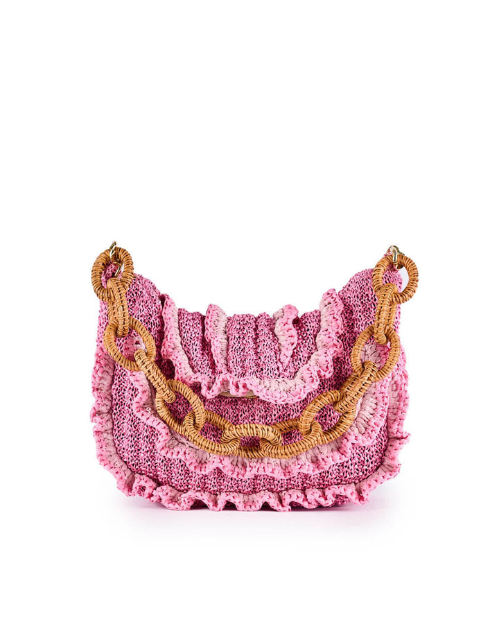 Pink ruffled handbag with woven handle and chain accents