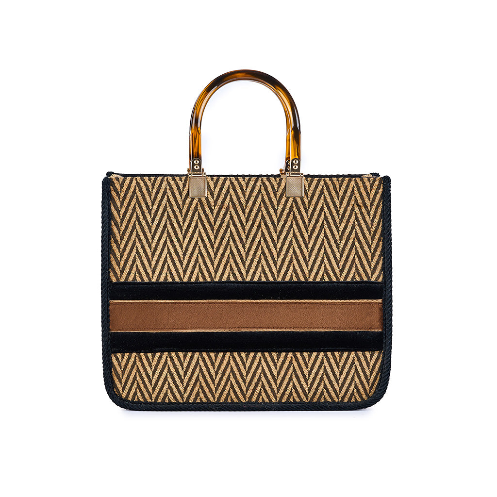 Elegant woven handbag with geometric pattern and amber handles