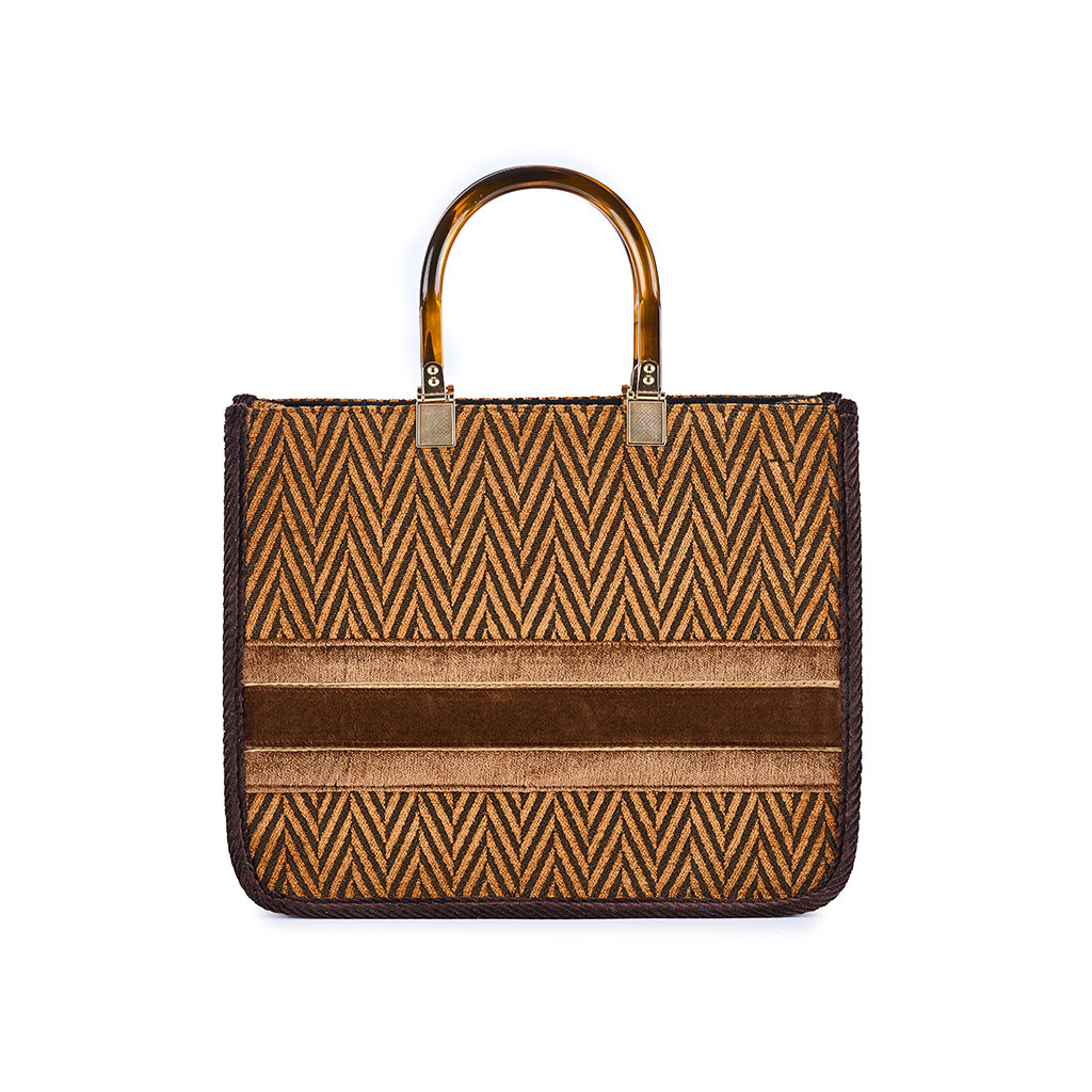 Brown and beige chevron pattern handbag with leather handles