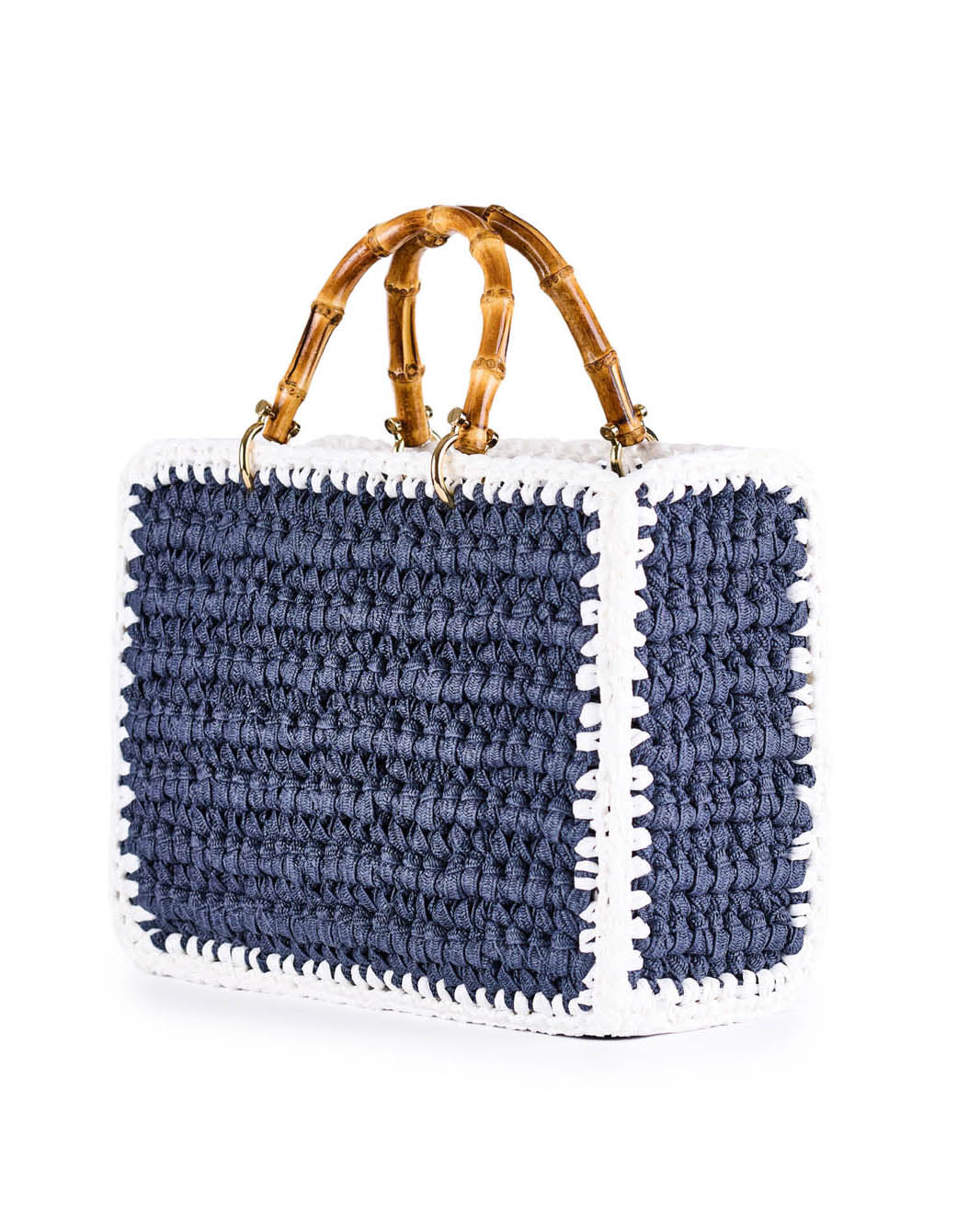 Handcrafted navy and white straw handbag with bamboo handles