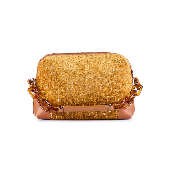 Golden textured handbag with chain strap on white background