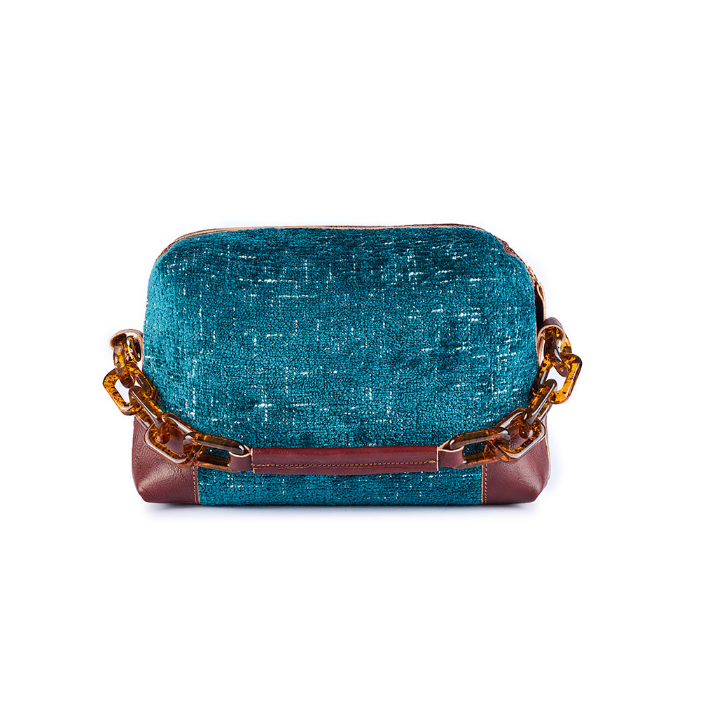 turquoise tweed handbag with brown leather accents and tortoiseshell chain strap