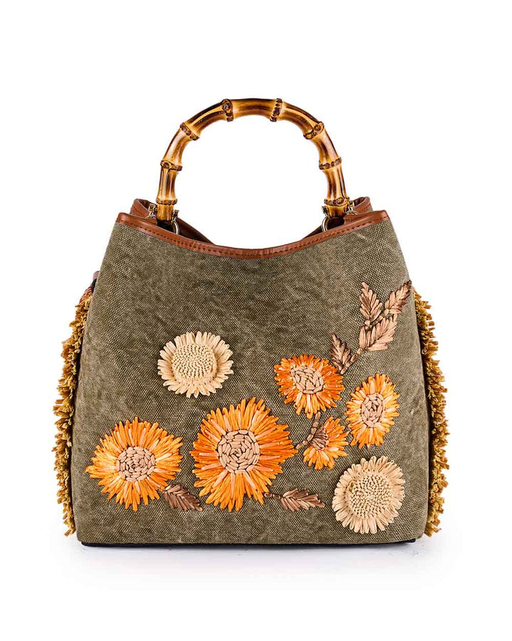 Olive green handbag with bamboo handles and floral embroidery