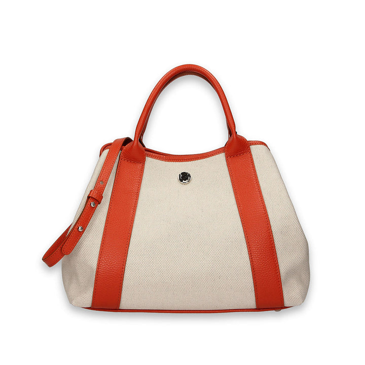 Red and white handbag with leather straps and a small central emblem