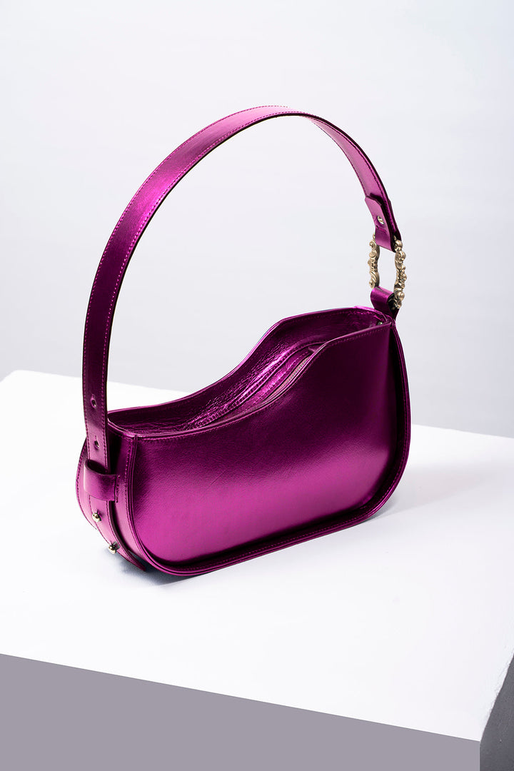 Purple metallic handbag with a curved design on a white and gray background