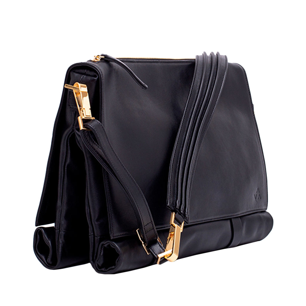 Elegant black leather handbag with gold hardware and shoulder strap