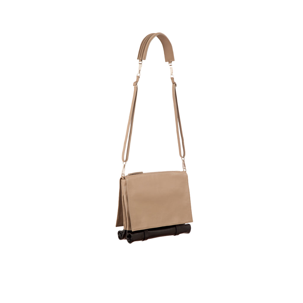 Tan crossbody bag with adjustable strap and rolled bottom