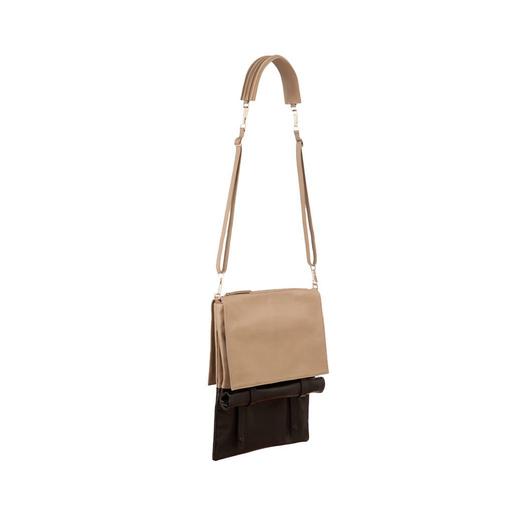 Tan and black leather crossbody bag with adjustable strap