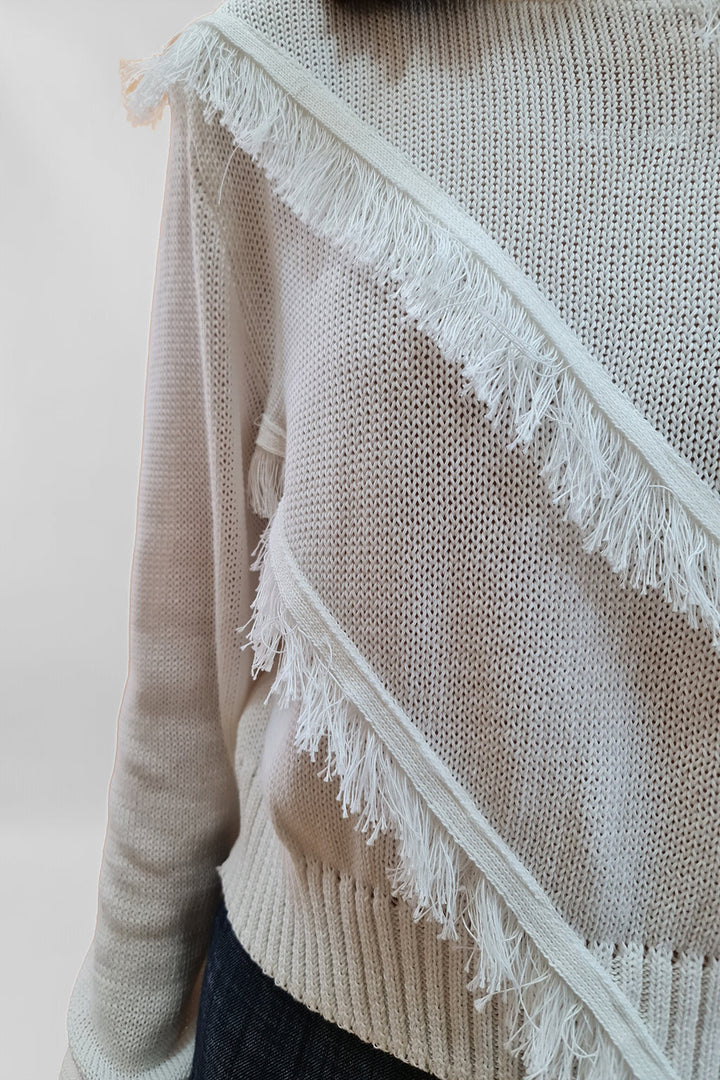 Beige knit sweater with fringe detail