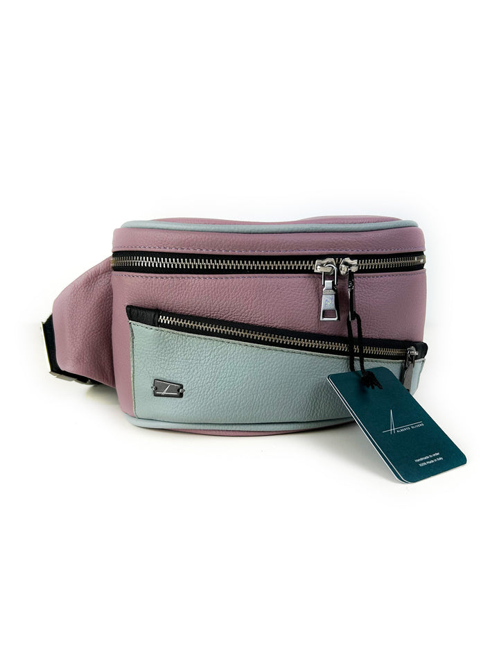 Pastel pink and blue leather fanny pack with multiple zippered compartments and a hanging tag