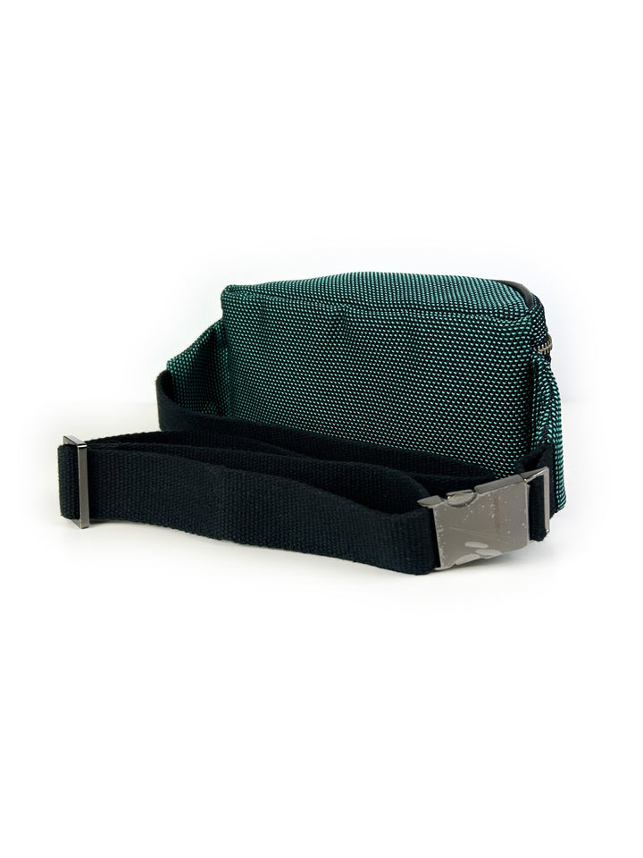 A green and black textured waist bag with an adjustable strap and metal buckle