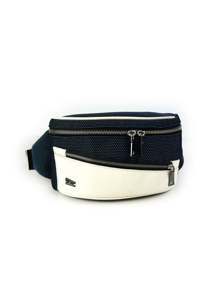 Navy blue and white leather crossbody fanny pack with zippered compartments