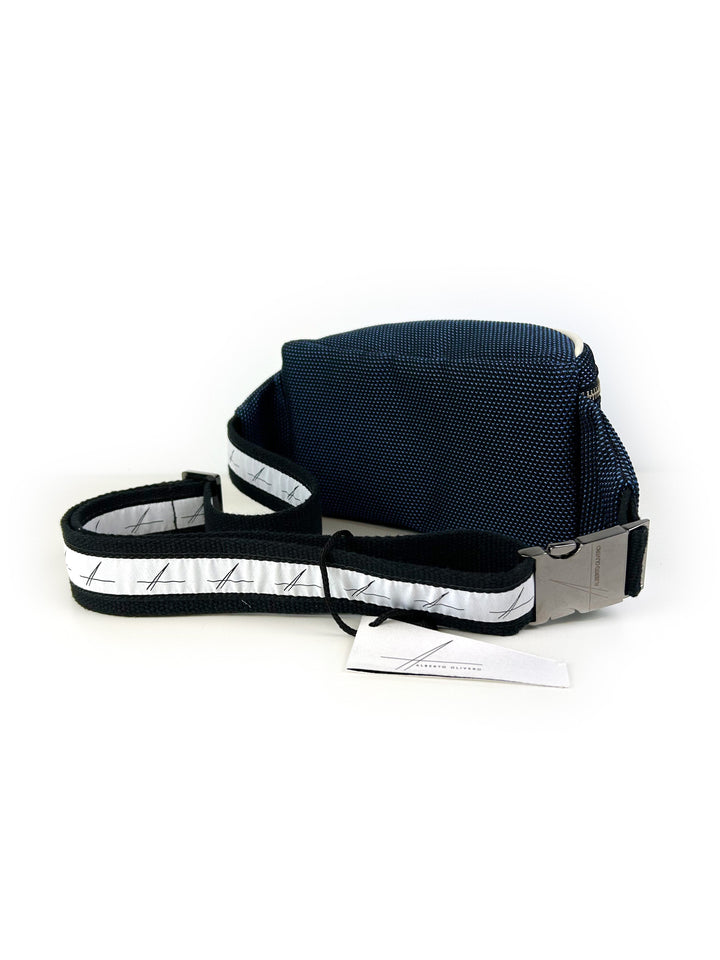 navy blue crossbody sling bag with adjustable strap and metallic buckle