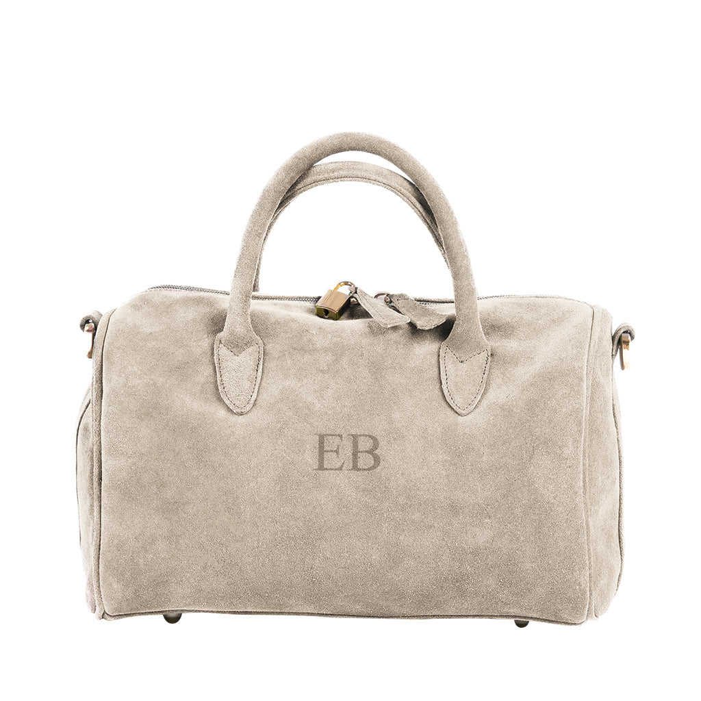 Beige suede handbag with monogram EB in the center