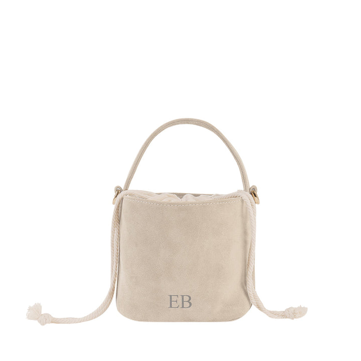 Beige suede drawstring handbag with initials EB on the front