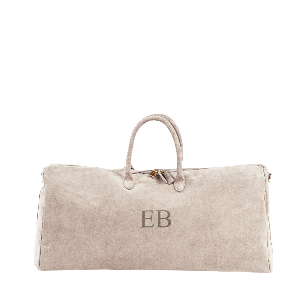 Beige suede duffel bag with EB monogram and leather handles