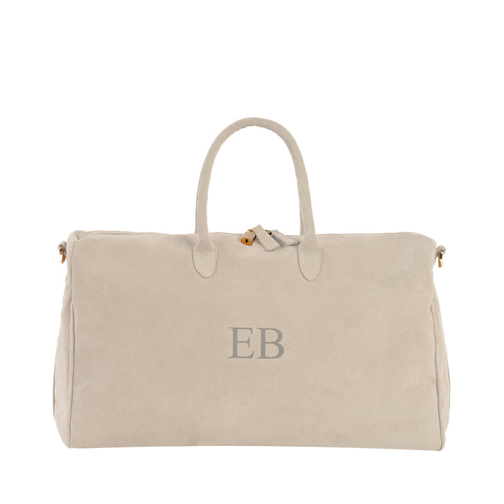 Beige suede weekender bag with monogram EB and gold hardware