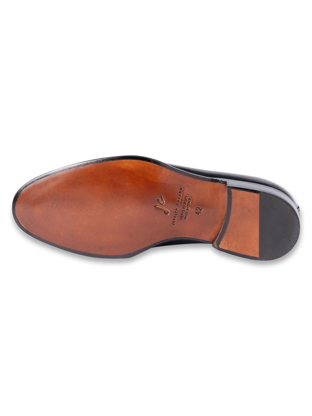Leather sole of a formal men's shoe with size 42 marking
