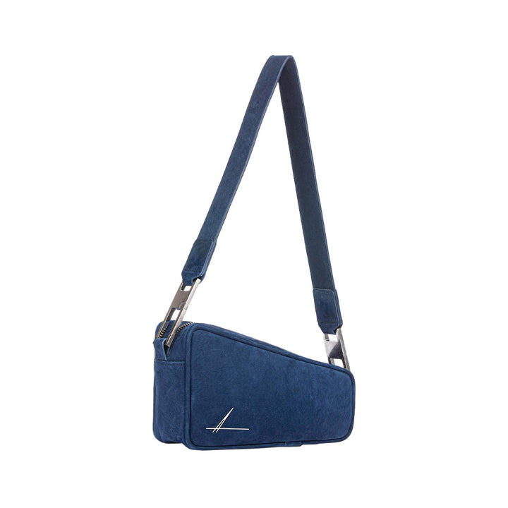 Blue suede shoulder bag with adjustable strap and modern design