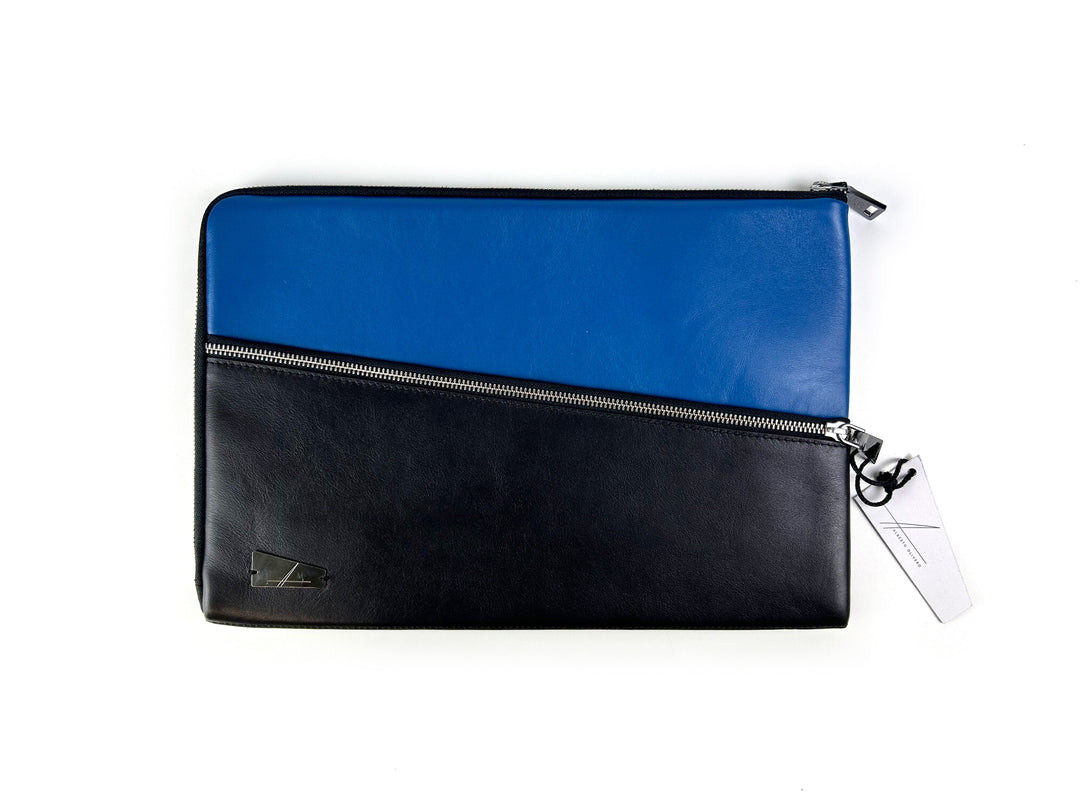 Stylish blue and black leather laptop sleeve with zipper closure