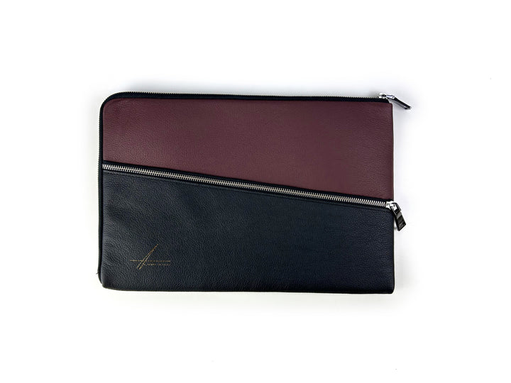 Two-tone leather laptop sleeve with zipper closure