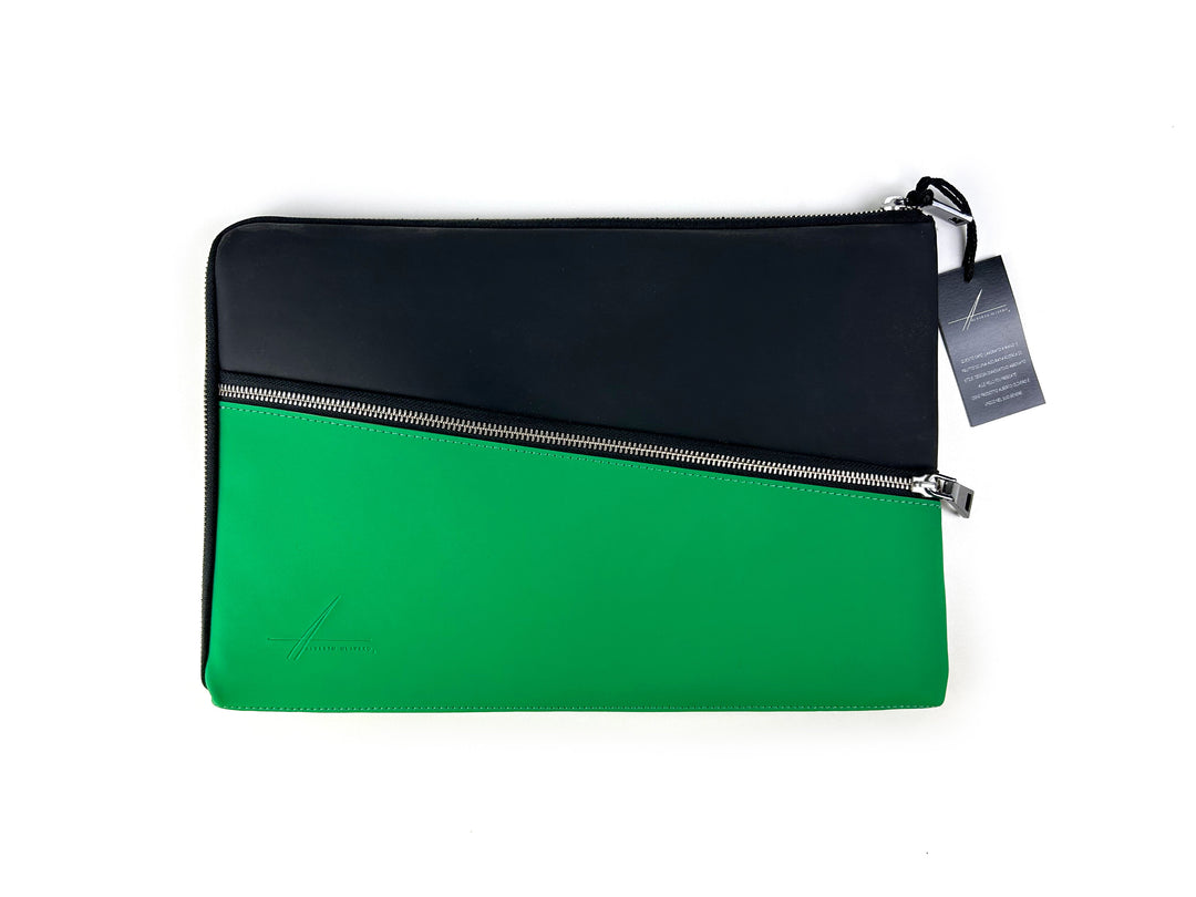 Green and black zipper pouch against white background