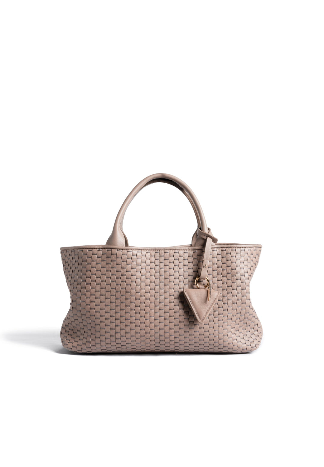 Woven beige handbag with top handles and decorative charm