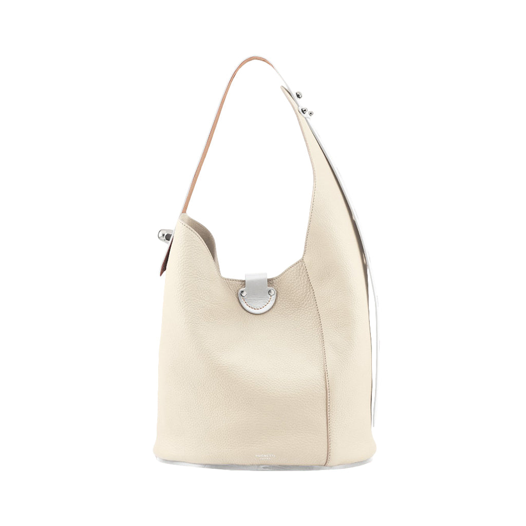 Cream-colored leather shoulder bag with a tan strap and silver accent details