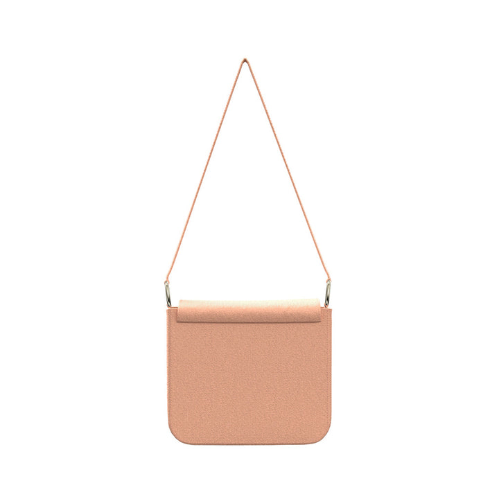 Peach leather crossbody bag with adjustable strap and minimalist design