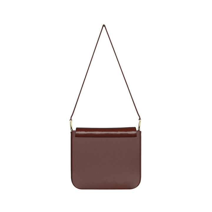 Brown leather shoulder bag with a minimalist design and a slim strap
