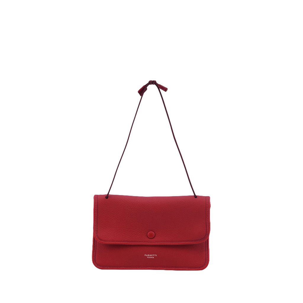 Red leather crossbody bag with a front flap and a single button closure