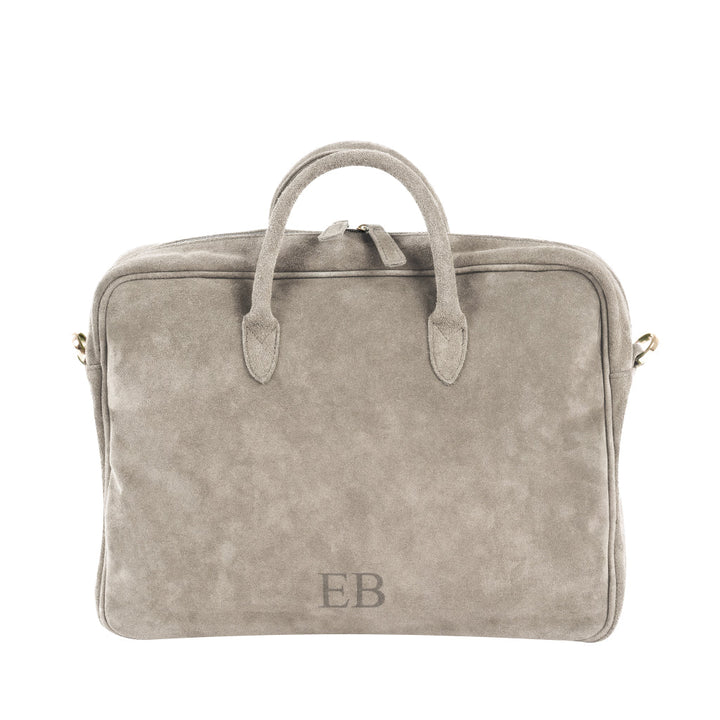 Tan suede briefcase with initials 'EB' embossed on the front