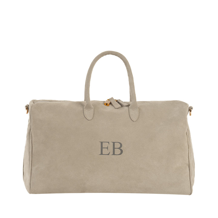 Beige suede travel bag with monogram initials 'EB'