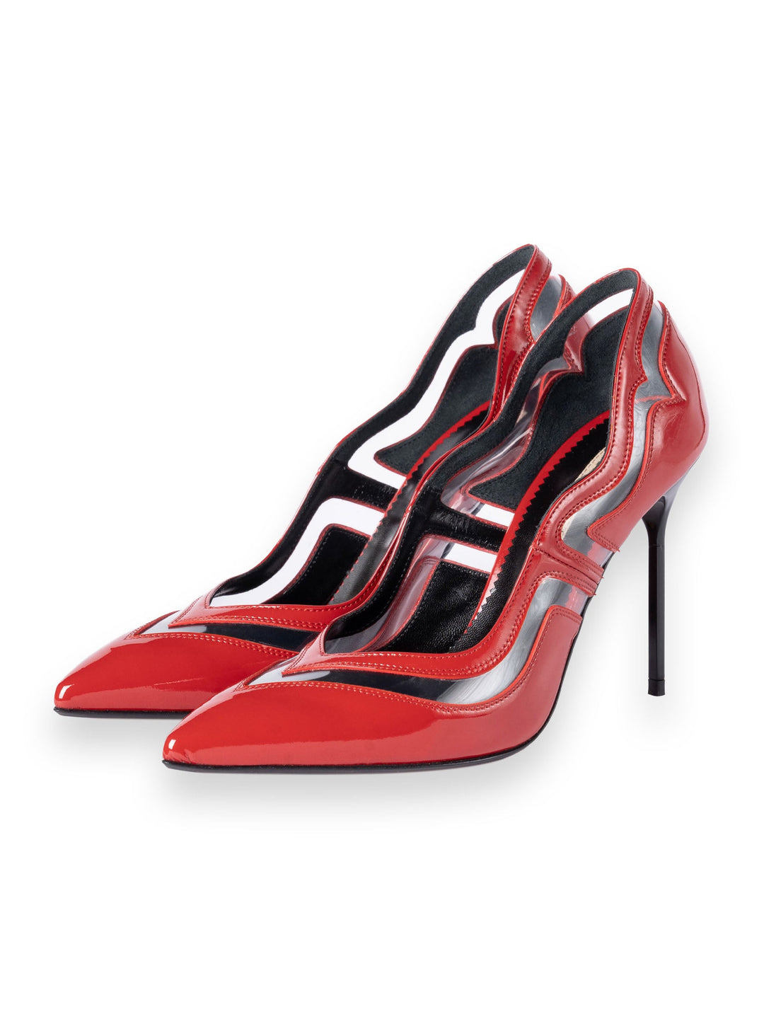 Red and black high heels with intricate cutout design and pointed toes