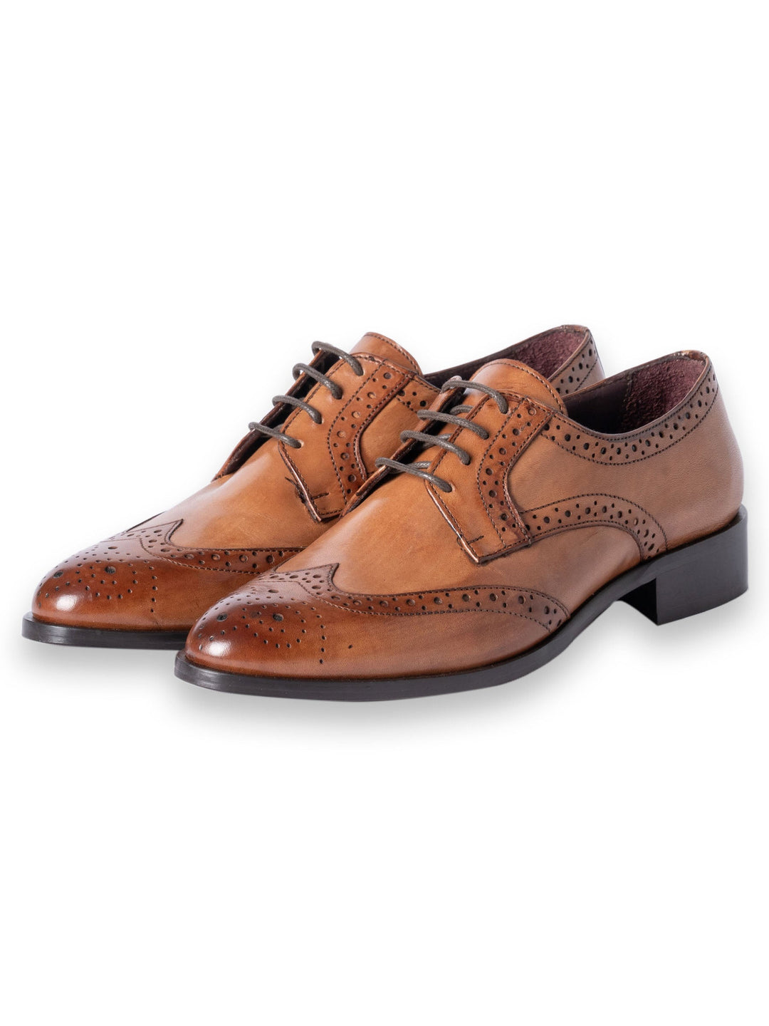 Brown leather brogue shoes with black laces on a white background